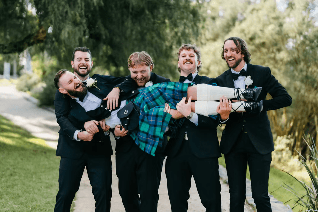 Group of men smiling