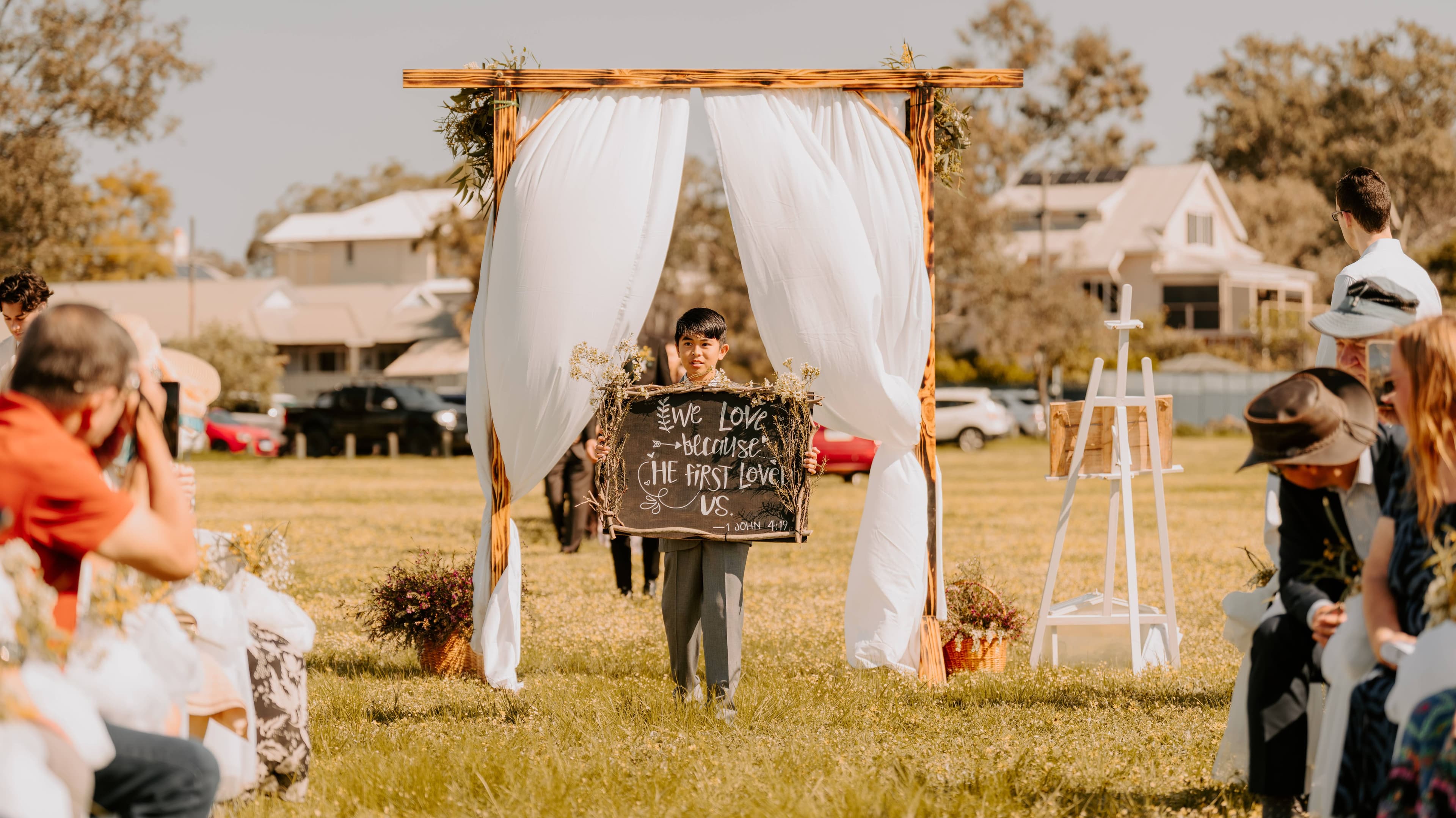 A baby walking; wedding ceremony