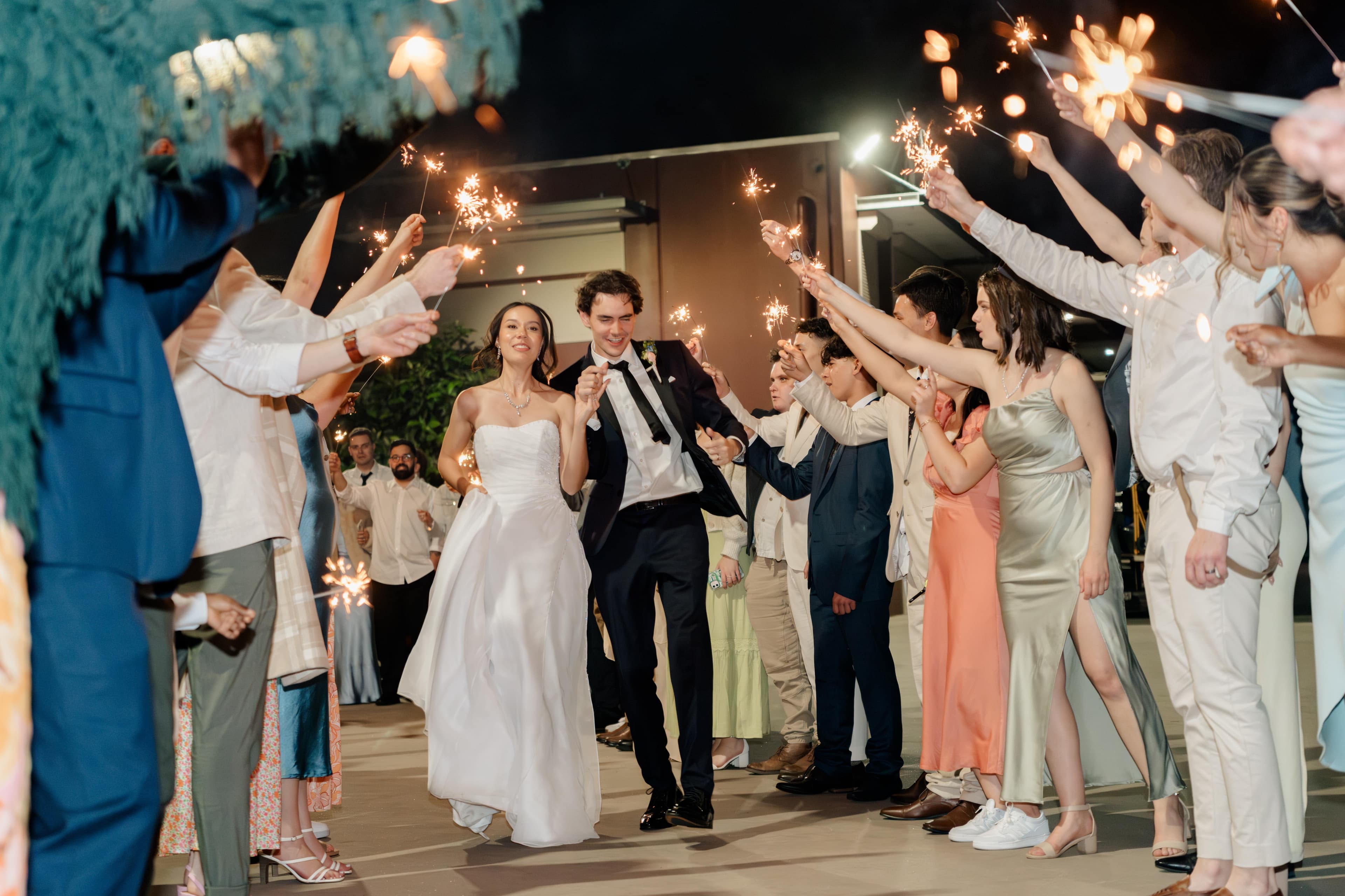 Wedding ceremony where everyone chanting while holding a wand