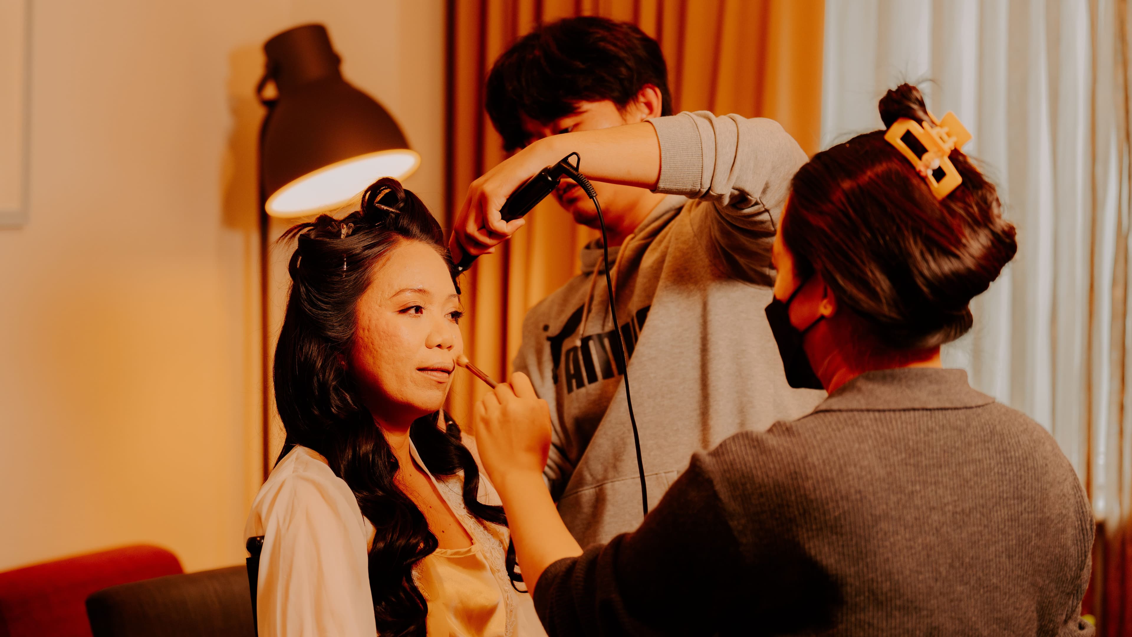 A bride preparing her makeup